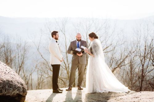 Couple reads vows at Jump Off Rock