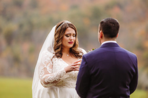 Bride cries during wedding vows