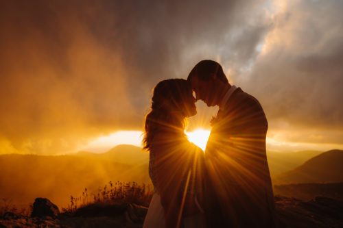 Light peaks through couples photos 