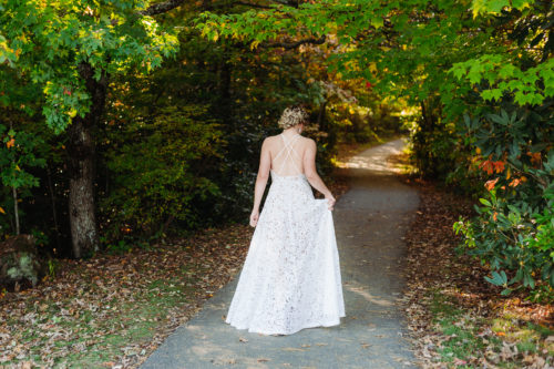 Bride walks along path Wisemans View Elopement 