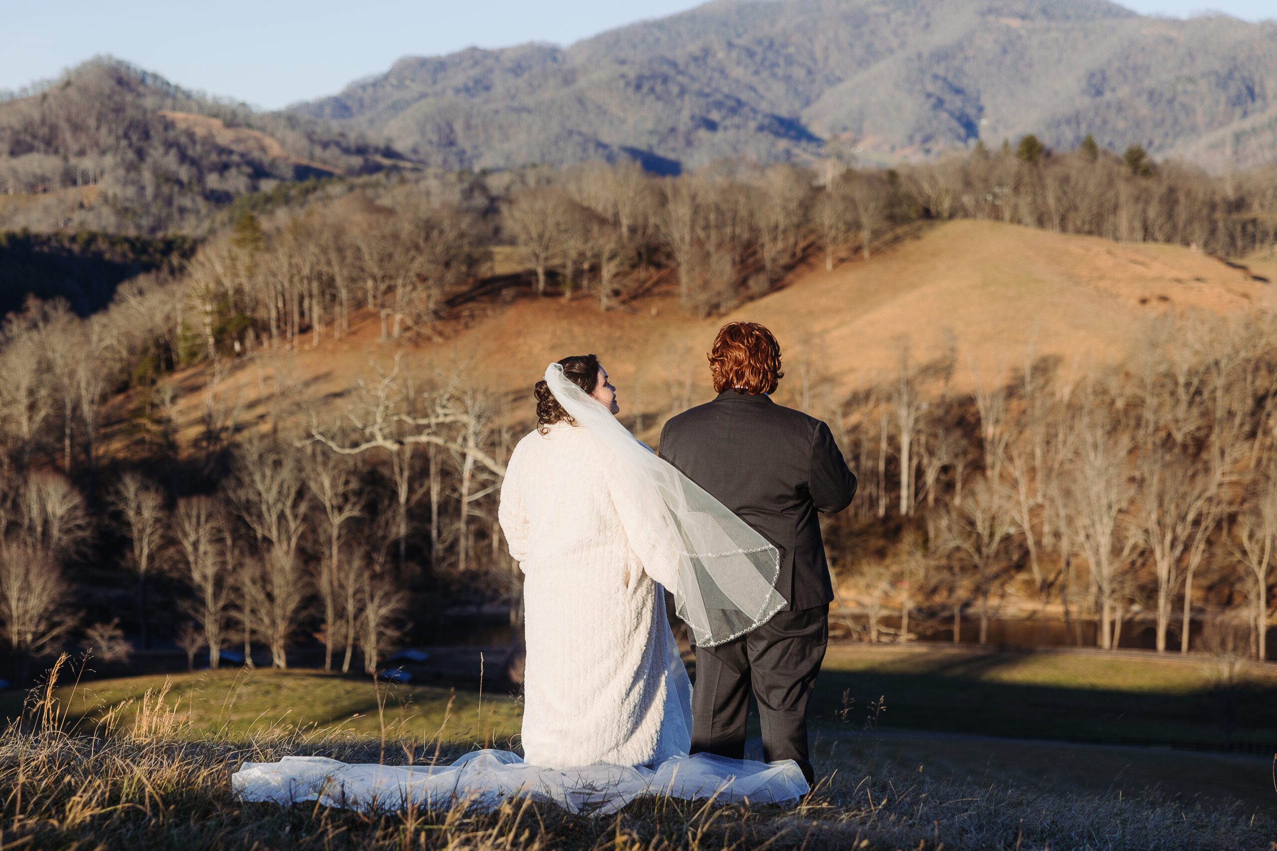 Andy and Jane looking out into the horizon at their wedding