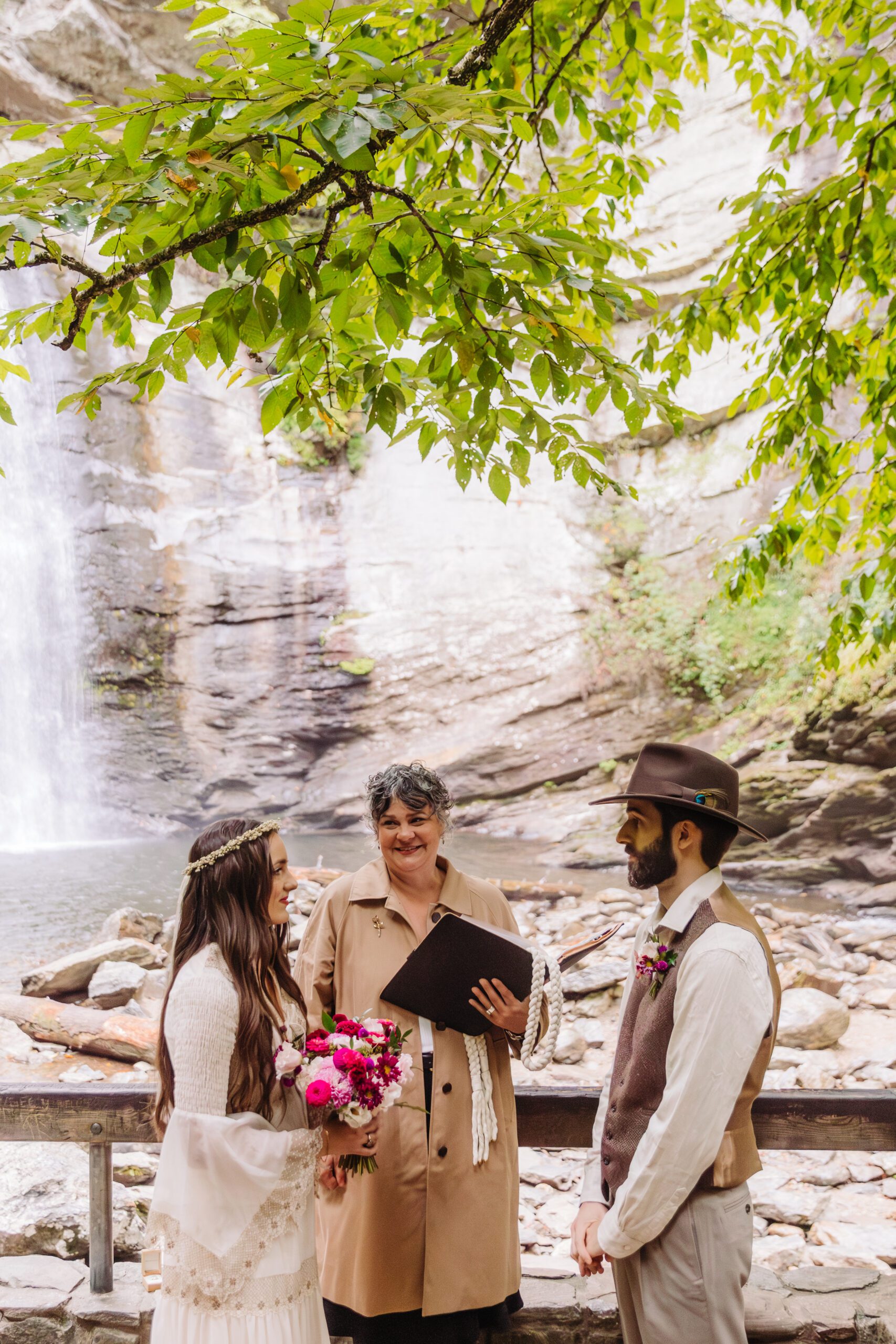 A collection of images showcasing the highlights of a couple’s waterfall elopement day—an intimate ceremony, the bride’s bouquet, the groom’s boutonniere, and other special moments, all set against the backdrop of lush greenery and the stunning waterfall.