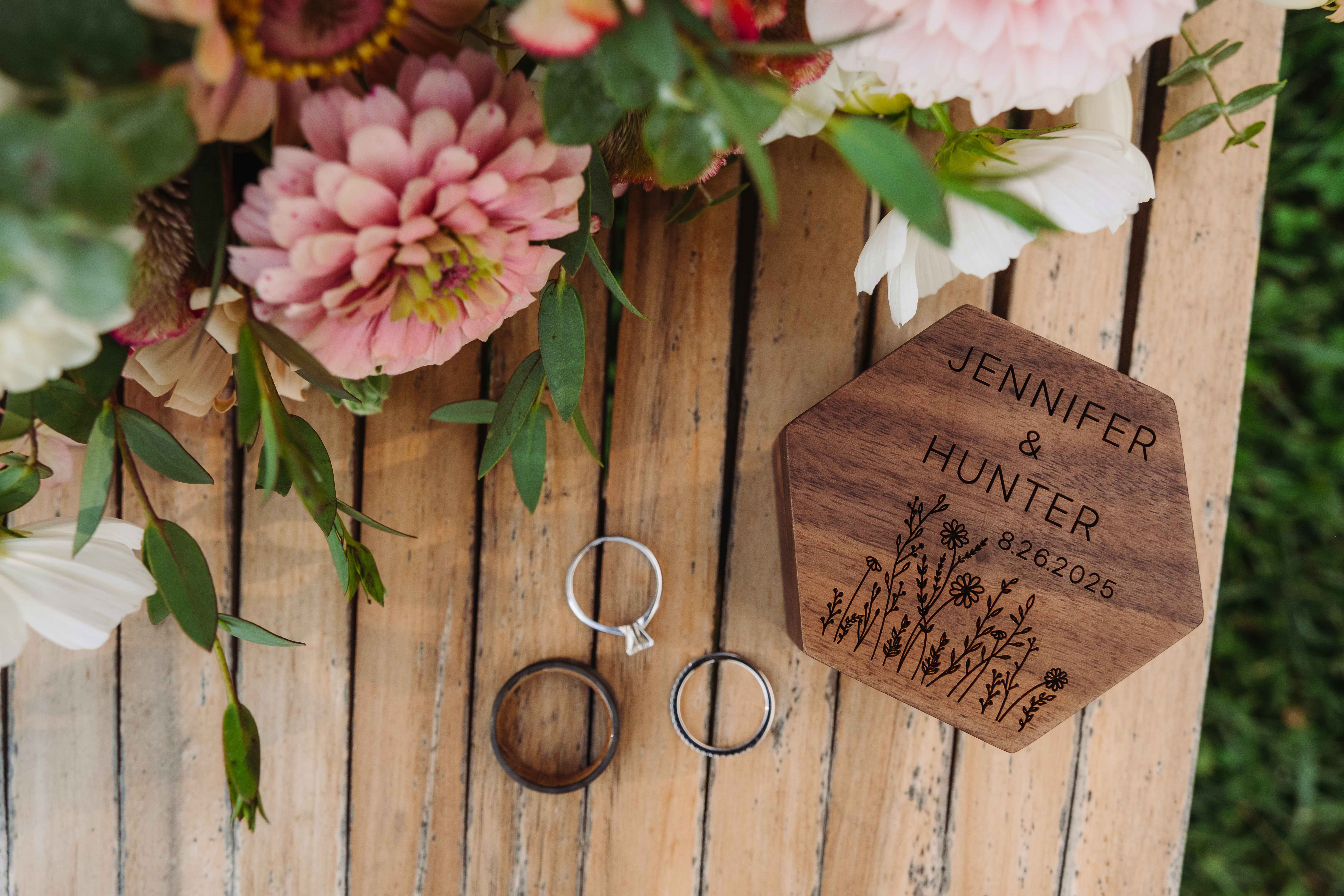 wedding rings and an engraved wooden box for an elopement