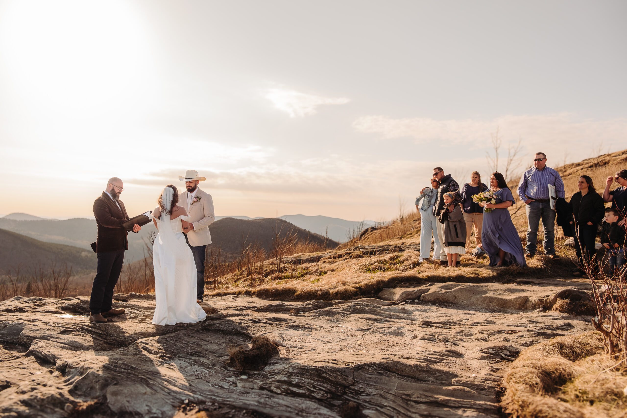 small elopment ceremony at sunset, one of the scenic places to elope in Asheville.