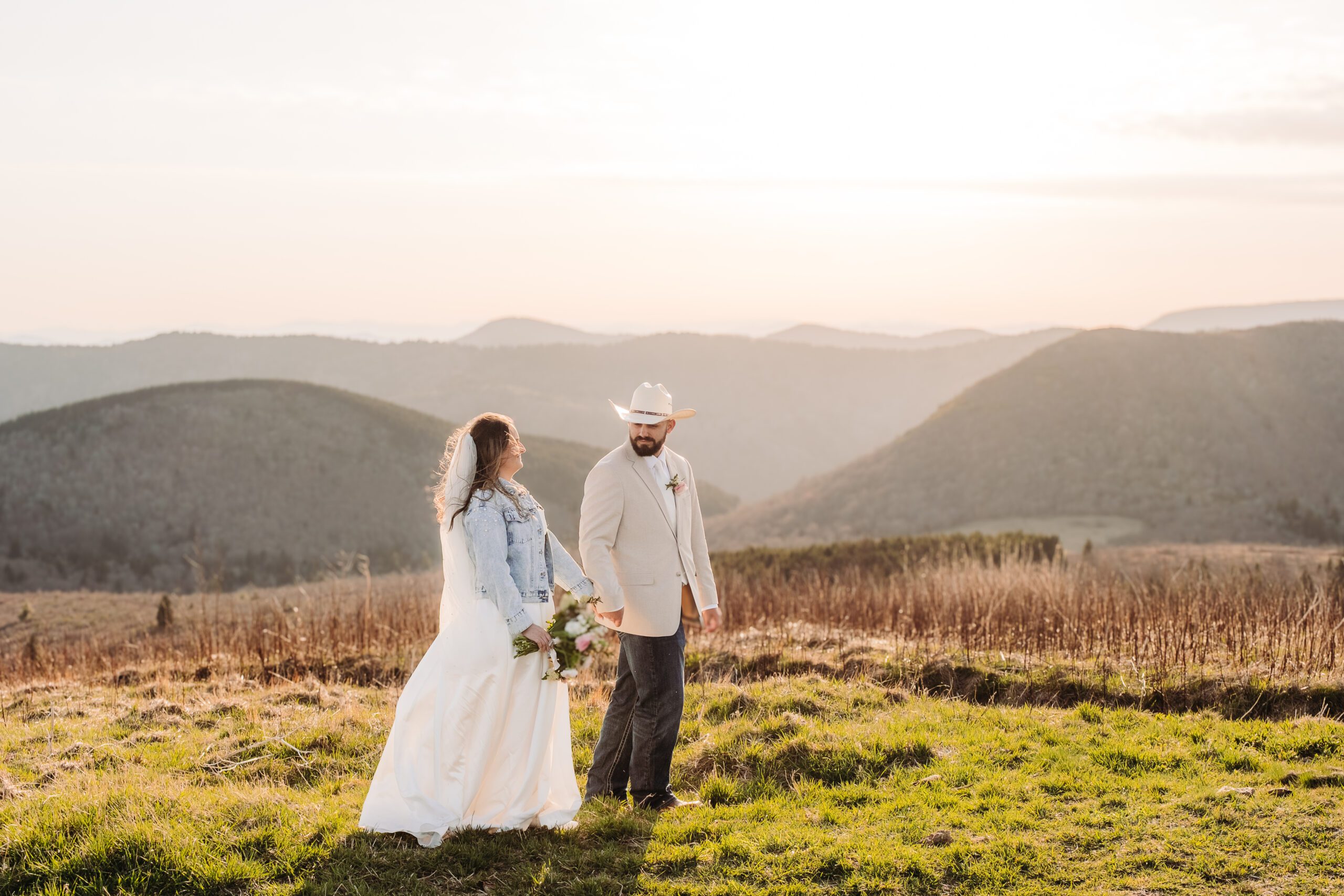 husband and wide holding hands after their ceremony at one of the places to elope in Asheville.