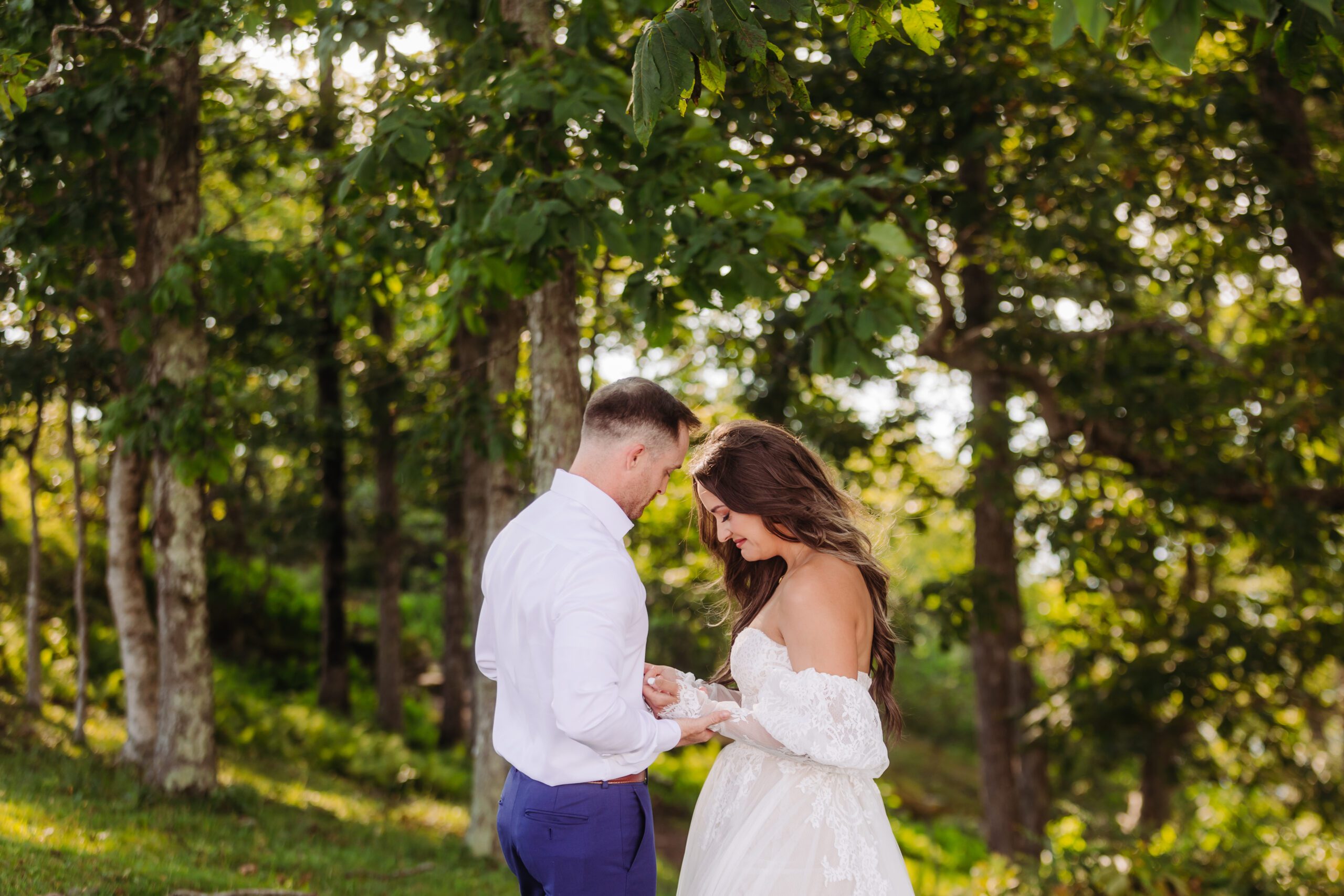 bride and groom sharing a sweet moment during their elopement in one of the places to elope in Asheville.
