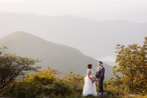 Bride and groom on Blue Ridge Parkway at Craggy Pinnacle