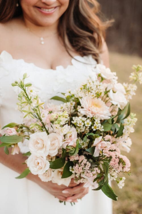 Soft bridal bouquet with seasonal blooms, romantic detail for places to elope in Asheville NC