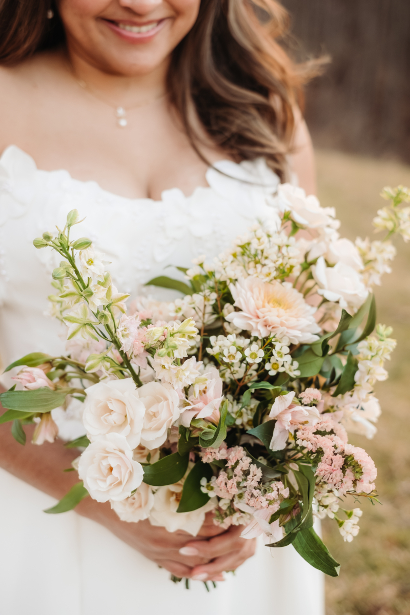 Soft bridal bouquet with seasonal blooms, romantic detail for places to elope in Asheville NC