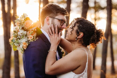 Golden hour elopement portraits of couple in forest near Asheville NC