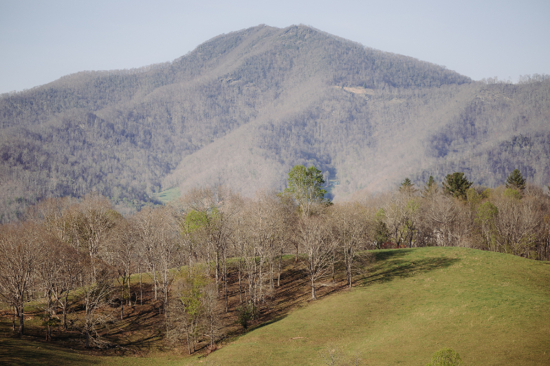 Scenic mountain landscape with soft light, setting the tone for a peaceful adventure elopement package experience