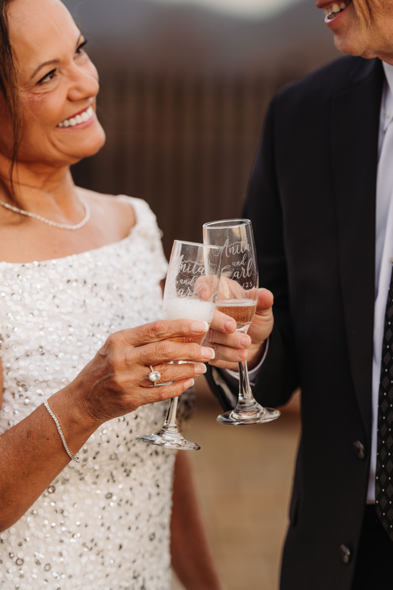 couple toasting with champagne glasses close up romantic celebration moment