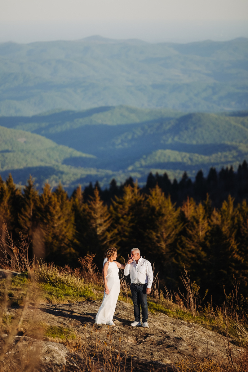 Blue Ridge Mountain wedding guidance with couple overlooking scenic mountain views during an outdoor elopement
