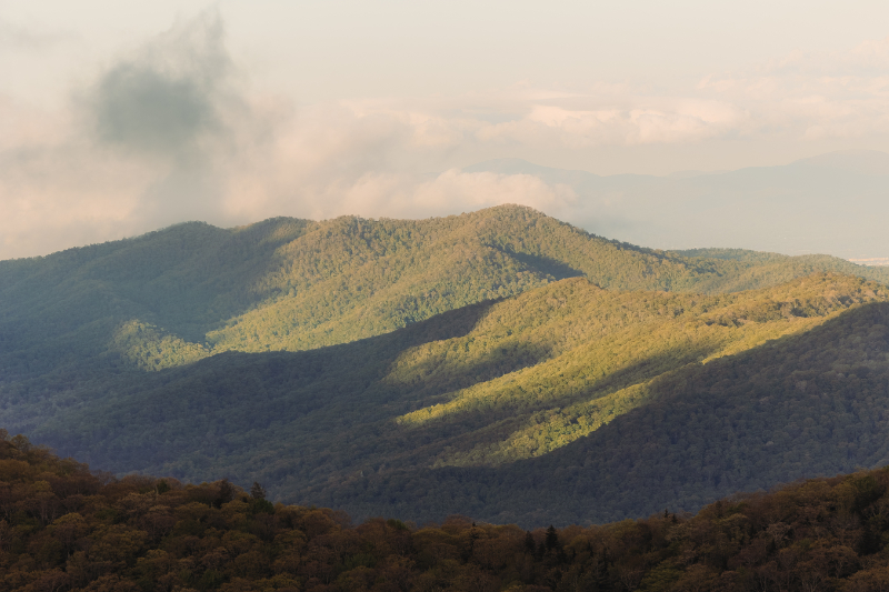 Blue Ridge Mountain wedding guidance with peaceful mountain views and soft golden sunset light over the hills