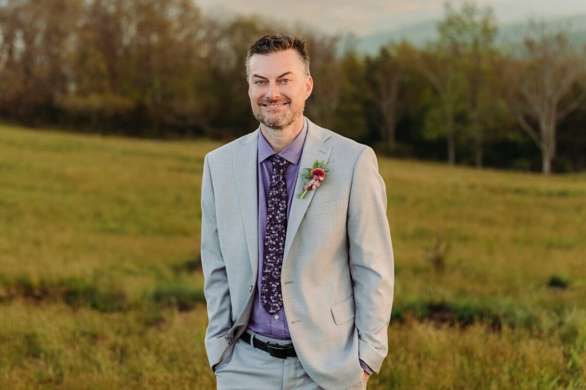 Charles poses for a groom portrait during his Bearwallow Mountain elopement.