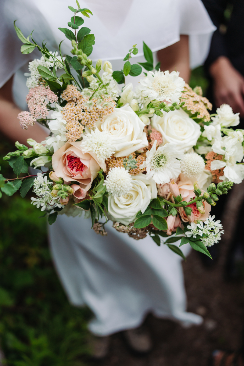 Bridal bouquet with seasonal flowers during a destination elopement in the North Carolina mountains.