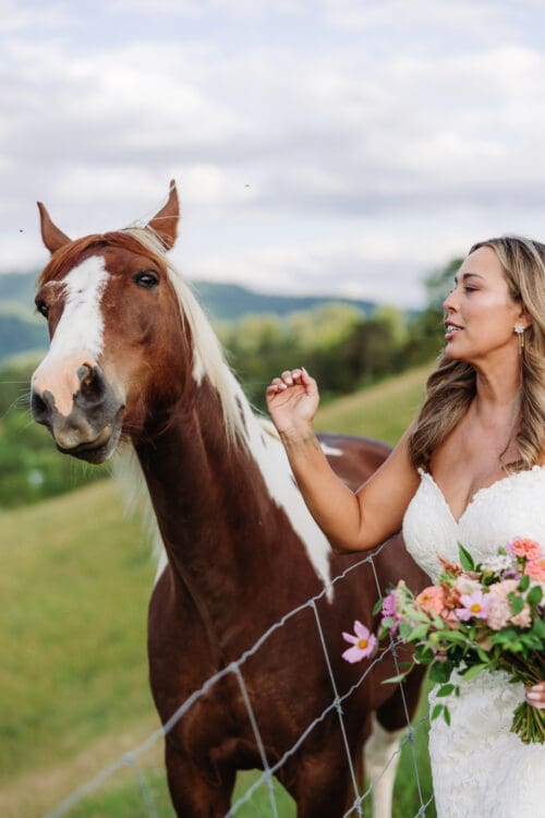 Bride spending time with a horse outdoors, offering playful second wedding ideas for nature lovers.